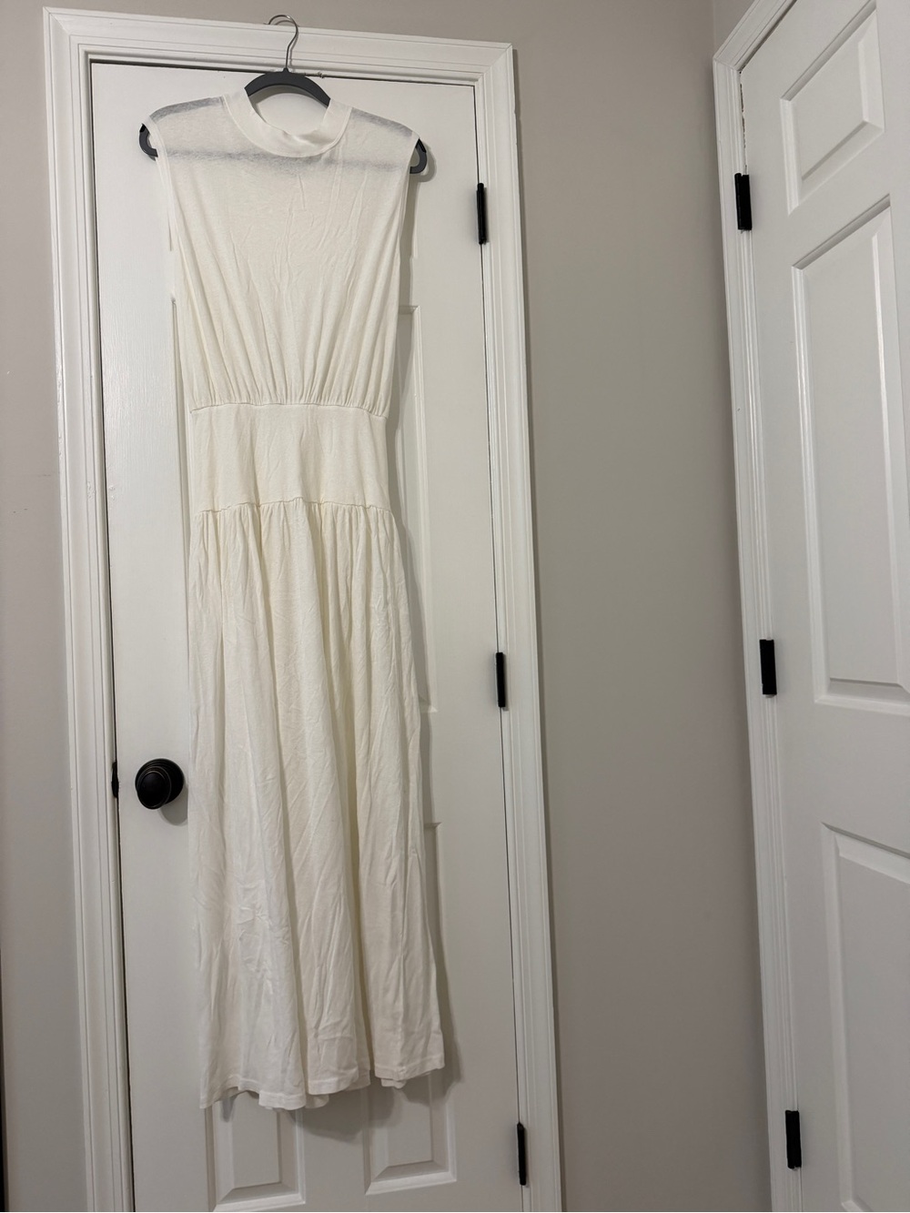 Sleeveless High-Neck Cream Maxi Dress